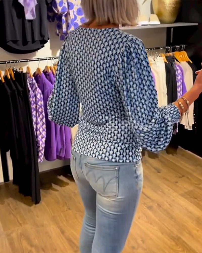 Lang ermet topp med dyp V-hals