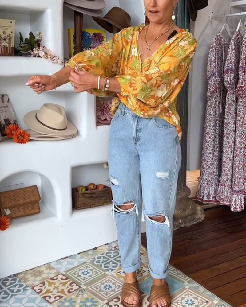 V-hals bluse med blomstertrykk