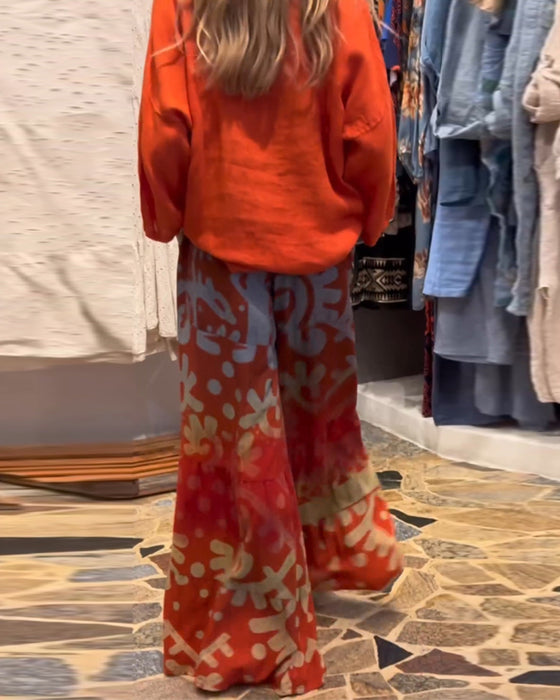 Løse bukser med brede ben med trykt lomme