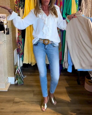 Designerbluser med volang for kvinner