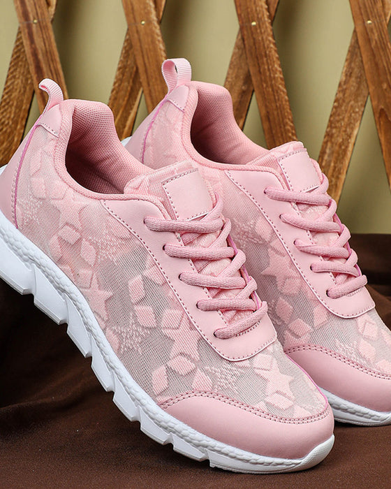 Enkle ensfargede pustende sneakers med snøring