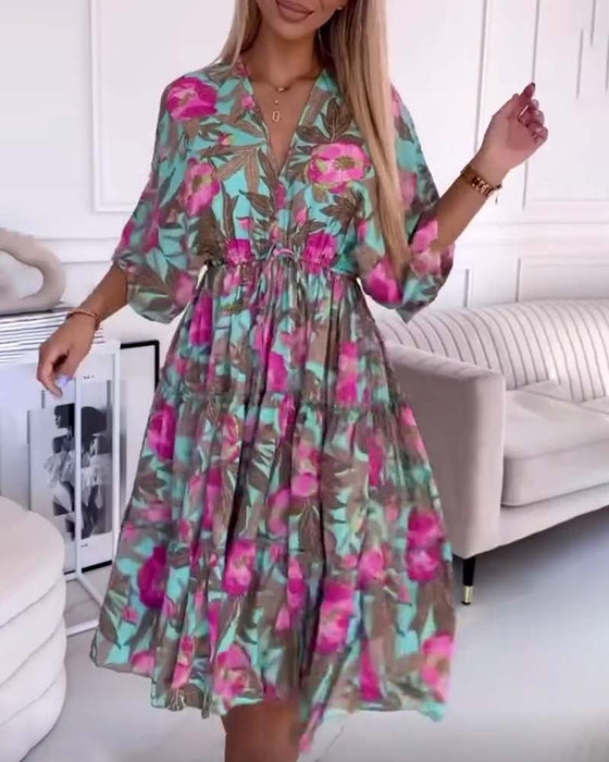 Elegant kjole med snøring og blomsterprint