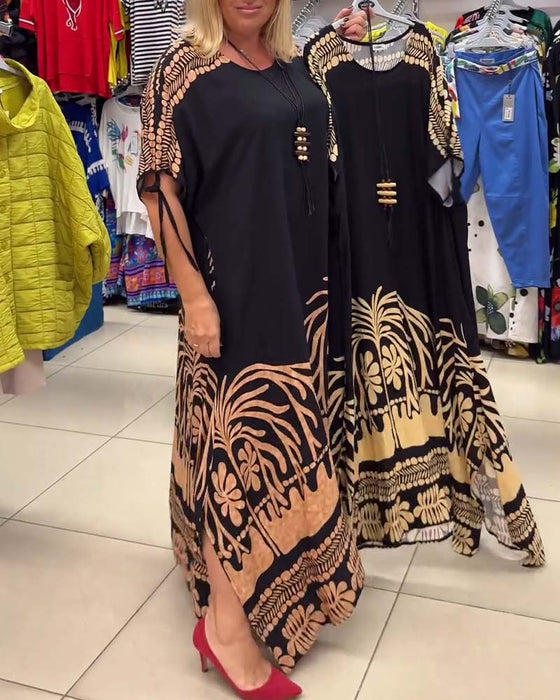 Kortermet løs kjole med snøring og trykt rund hals