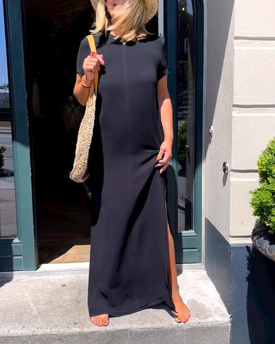 Elegant kjole med korte ermer i ensfarget