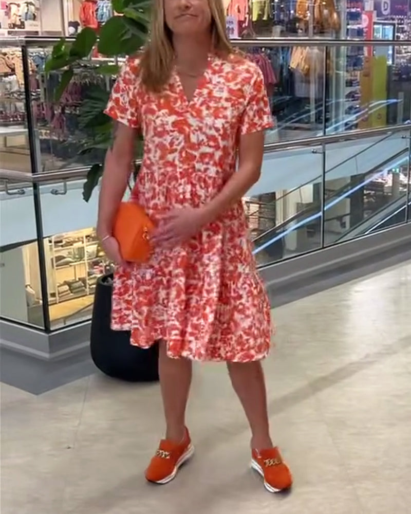 Kortermet midikjole med blomstertrykk