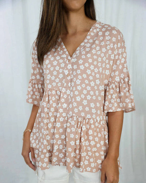 Blomstret bluse med V-hals klokkeermer