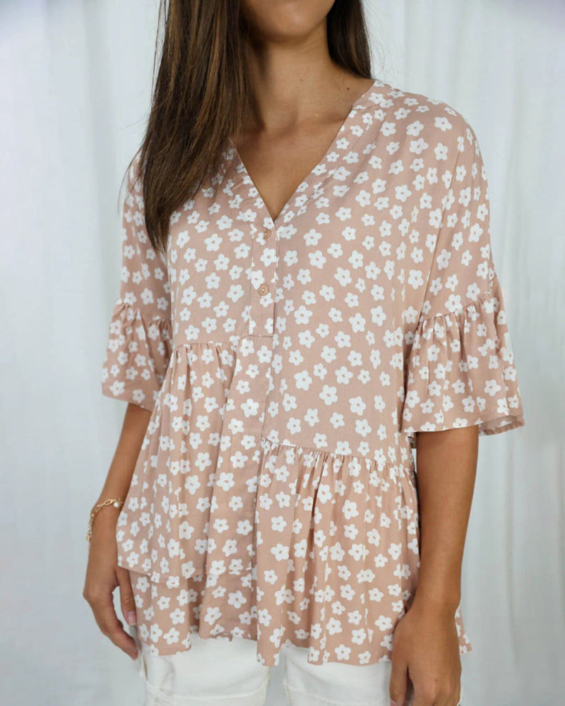 Blomstret bluse med V-hals klokkeermer