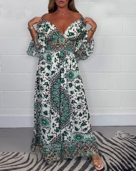 Jumpsuit med trykk og dyp V-hals