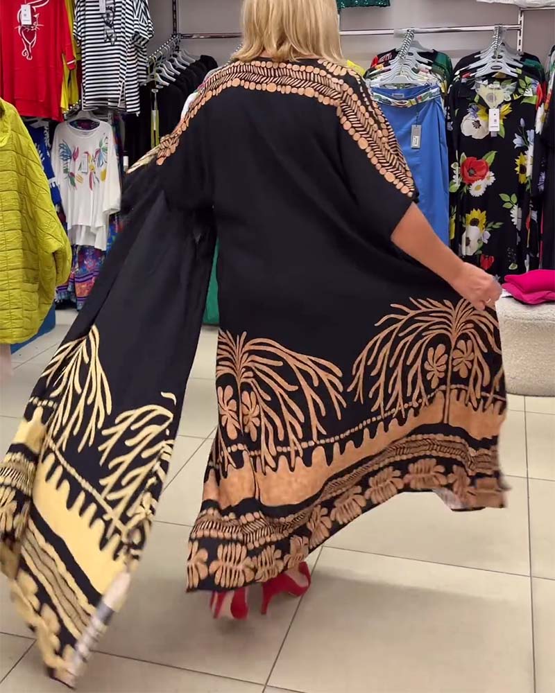 Kortermet løs kjole med snøring og trykt rund hals