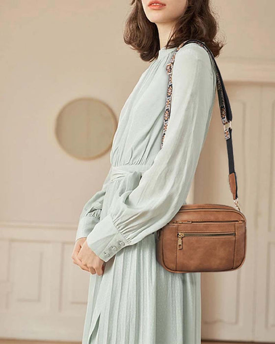 Multifunksjonell crossbody-veske med glidelås