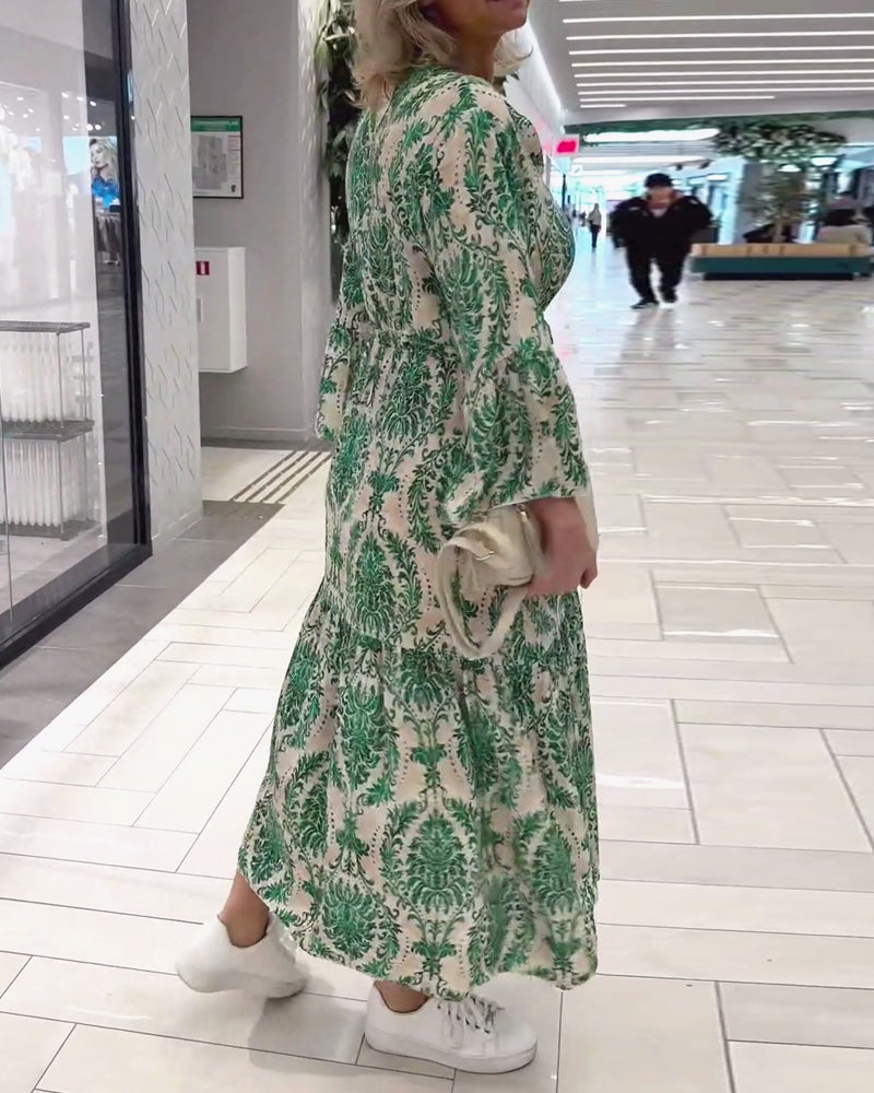 Kjole med snøring med klokkeermer