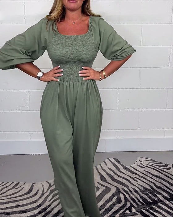 Ensfarget jumpsuit med firkantet hals