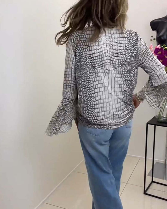 Bluse med blomstermønster og snor