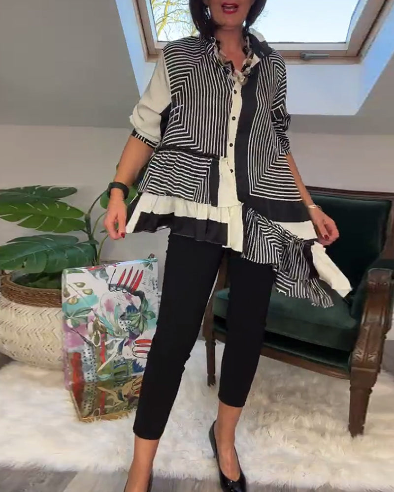 Uregelmessig patchworkskjorte med motetrykt knapp