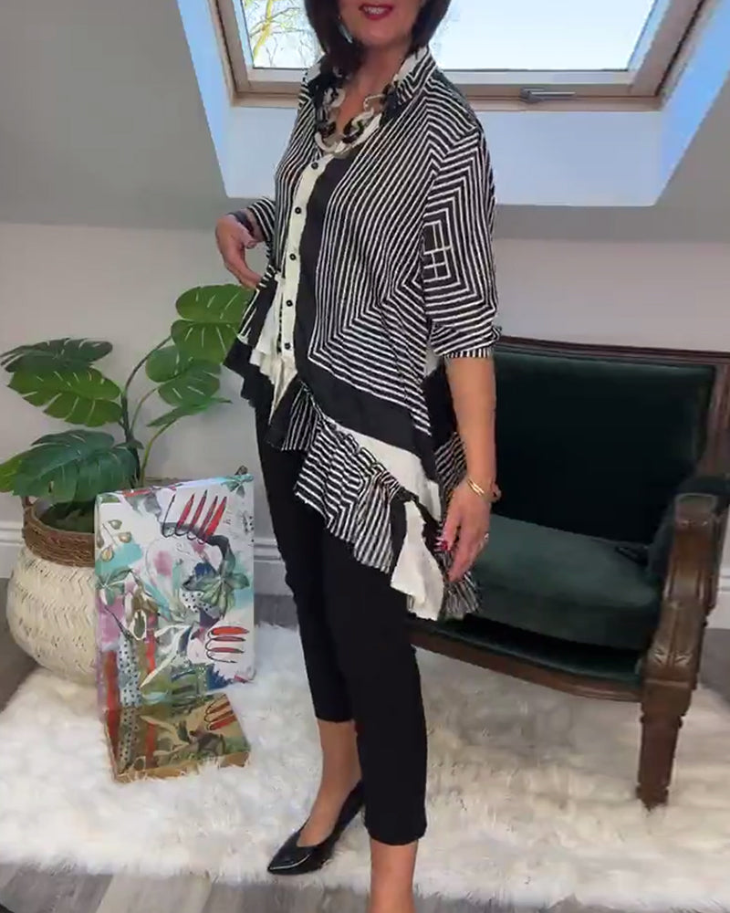 Uregelmessig patchworkskjorte med motetrykt knapp