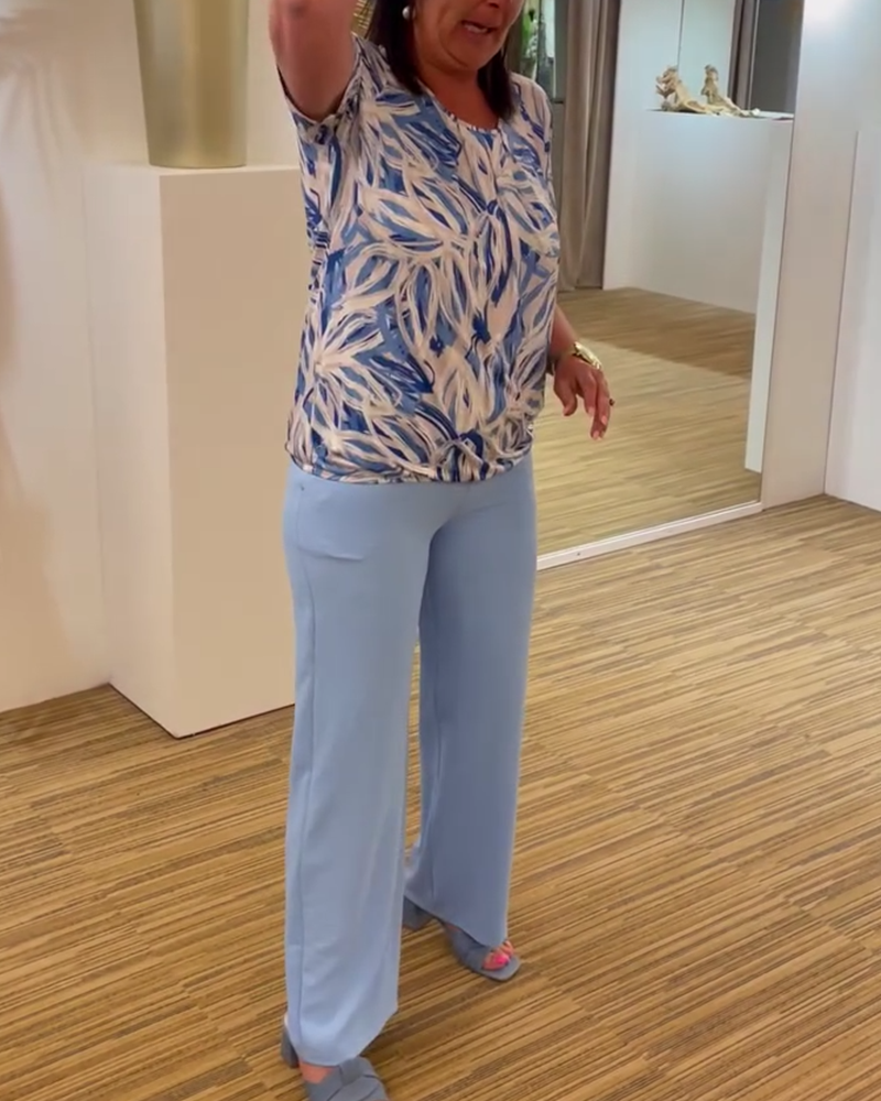 Trykt kortermet plisseret bluse med rund hals