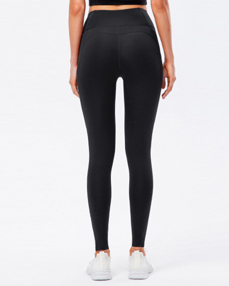 Ensfargede leggings med fleecelommer