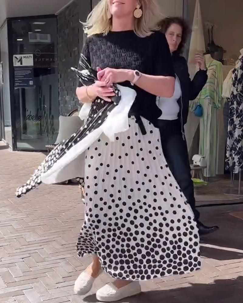 Elegant plissert skjørt med prikker