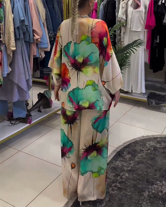 Lotus print sett med en skulder og trekvart erme