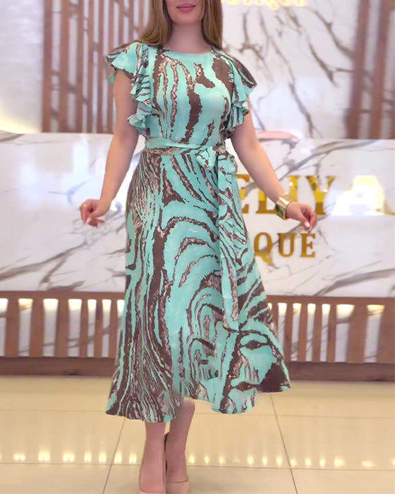 Elegant kjole med volanger med kontrasttrykk