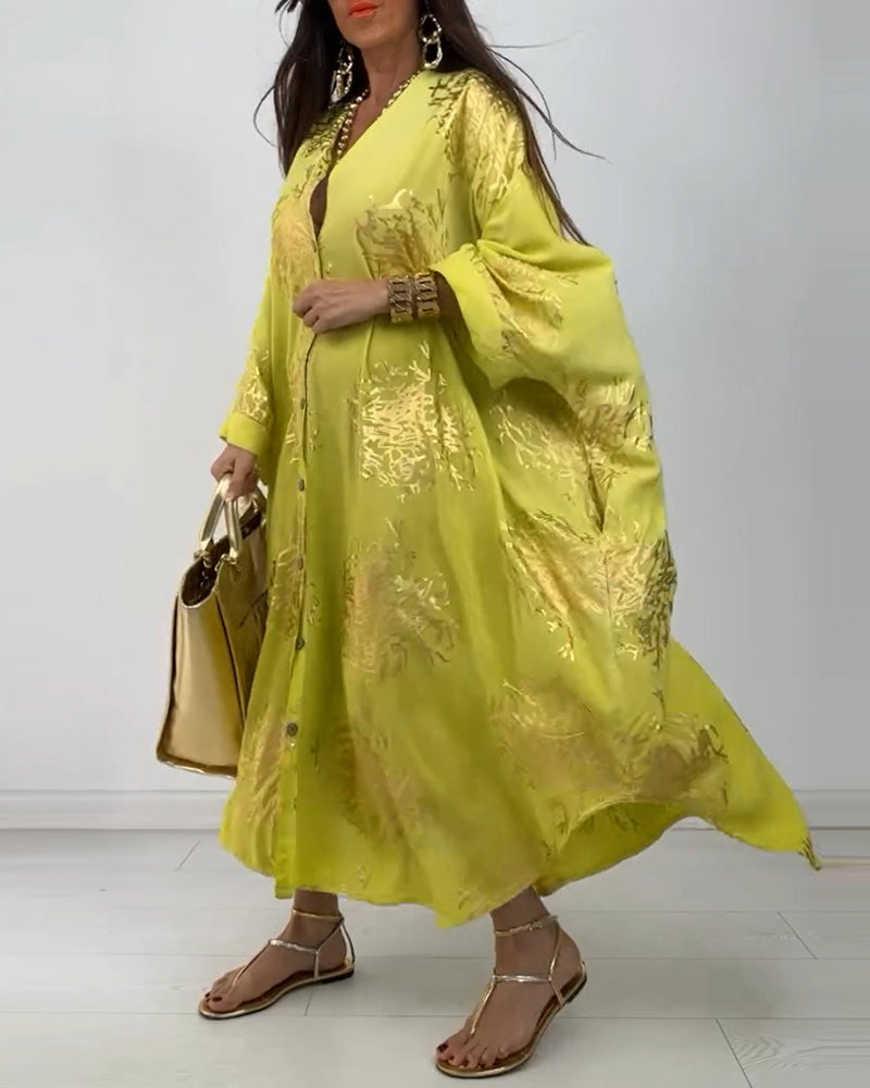 Langermet løs kjole med trykt knapp