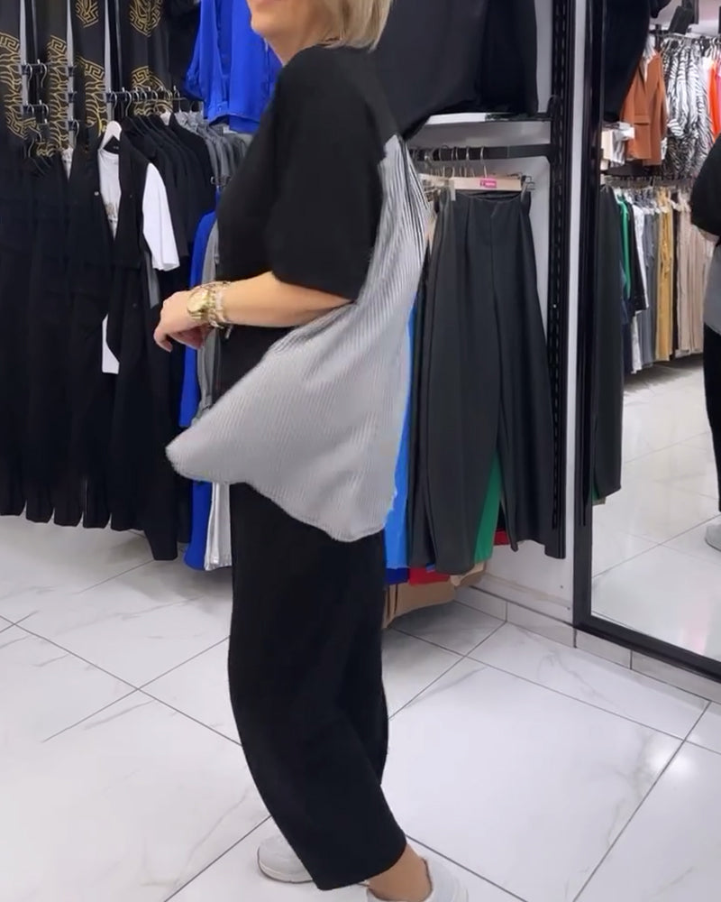 Uformell bluse med lappeteppe av nålestriper