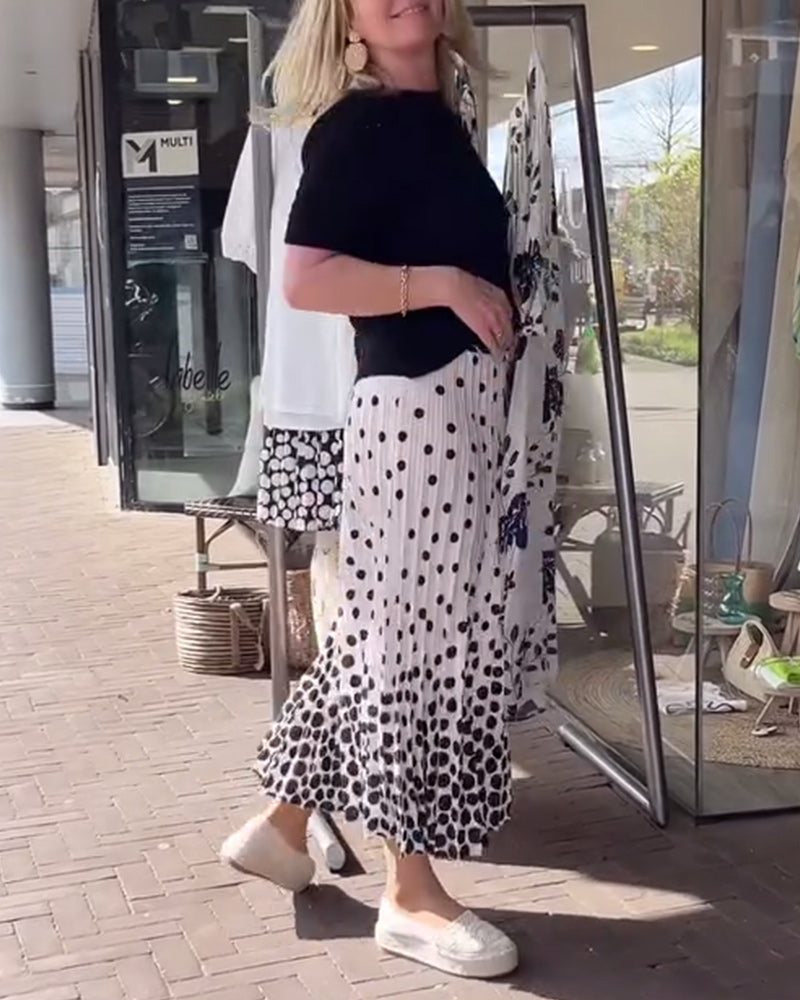 Elegant plissert skjørt med prikker