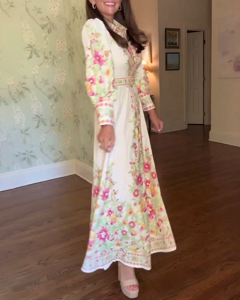 Elegant maxikjole med lange ermer i jakkeslag med blomstertrykk
