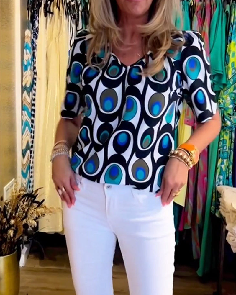 Avslappet topp med puffermer med geometrisk trykk