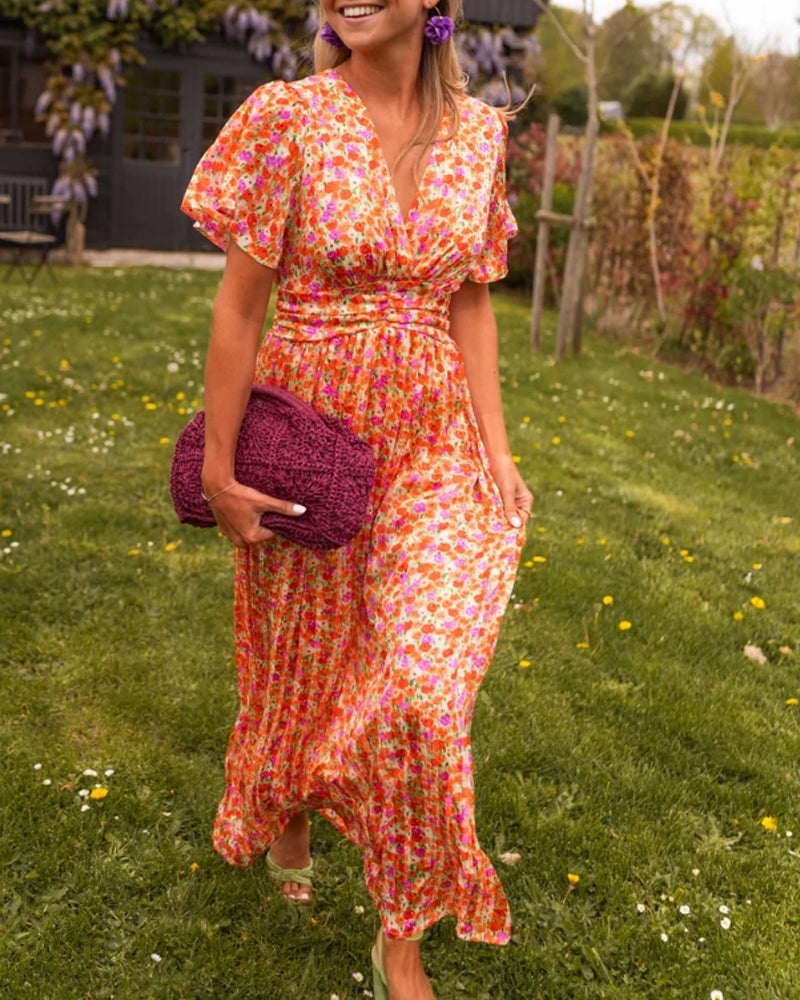 Blomstret kjole med V-hals