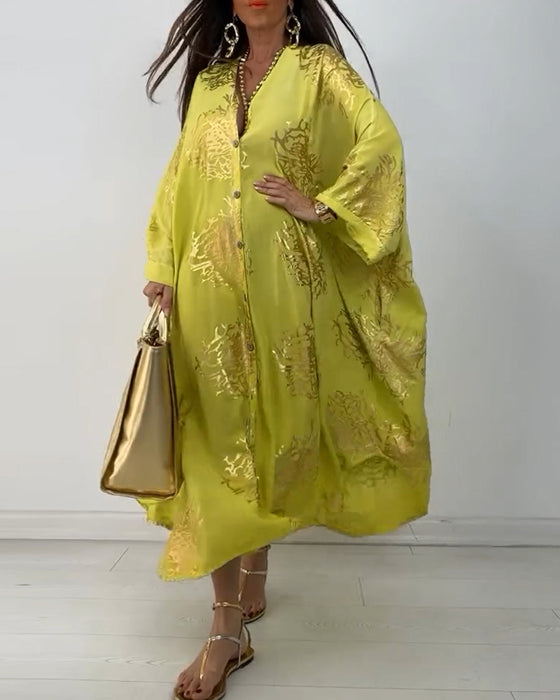 Langermet løs kjole med trykt knapp