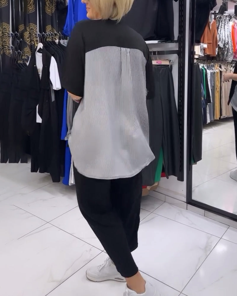 Uformell bluse med lappeteppe av nålestriper