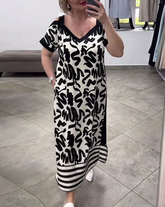 Kortermet kjole med off-the-shoulder print