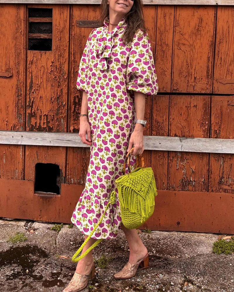 Elegant kjole med puffermer