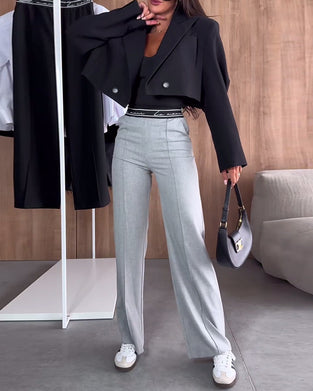 Uformelle ensfargede rette bukser med glidelåslomme