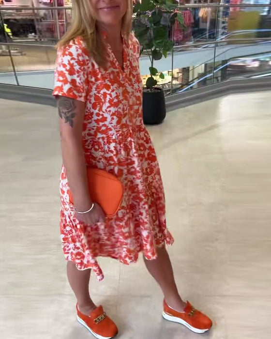 Kortermet midikjole med blomstertrykk