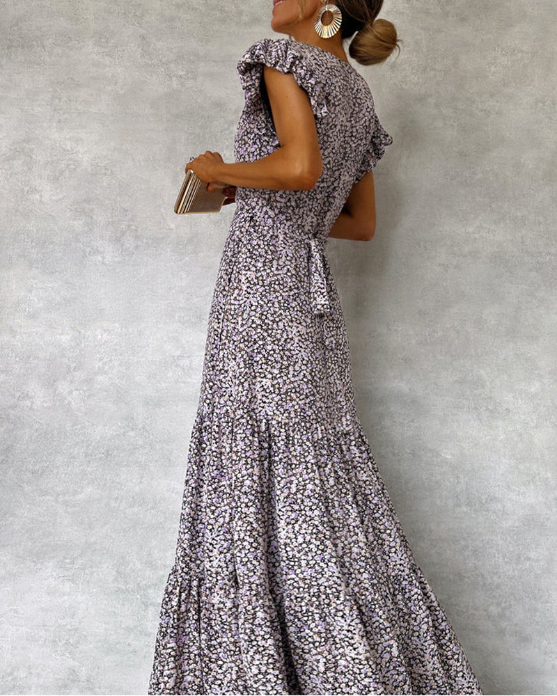 Elegant kjole med volanger og splitt