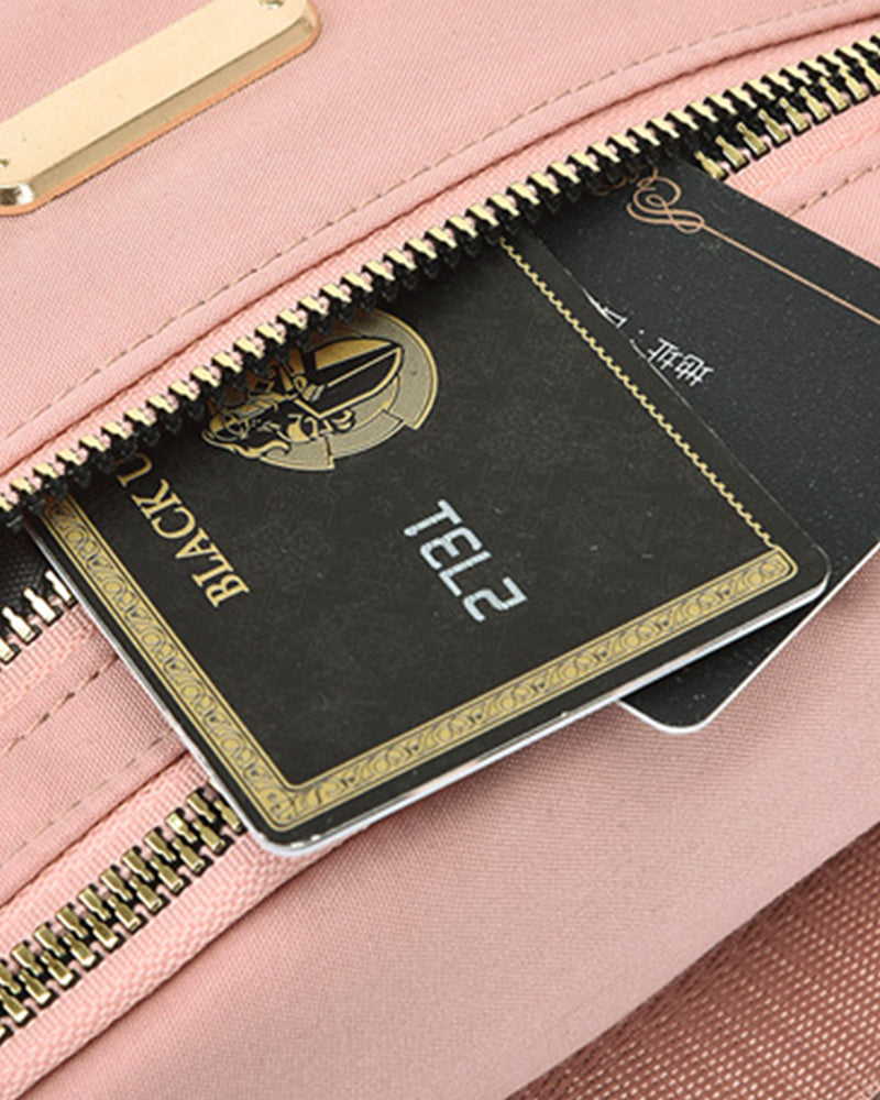 Enkel ensfarget skulderveske foran