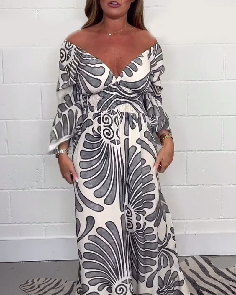 Deep V løs jumpsuit med retroprint og klokkeerm