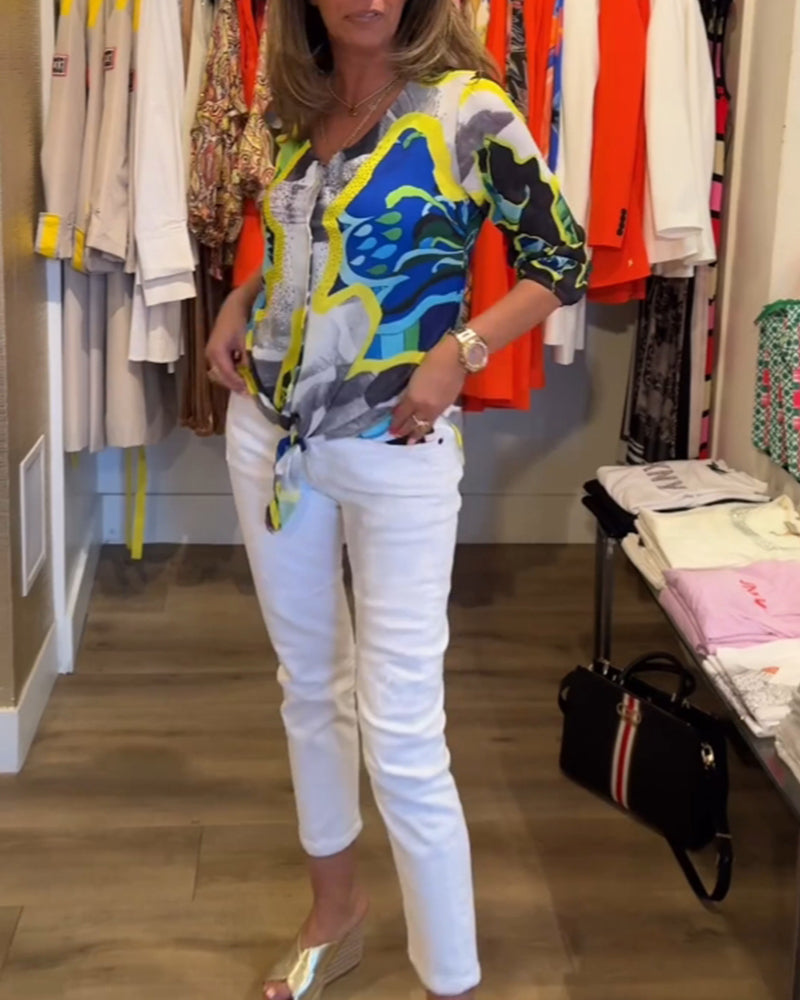 Bluse med V-hals med blomstertrykk