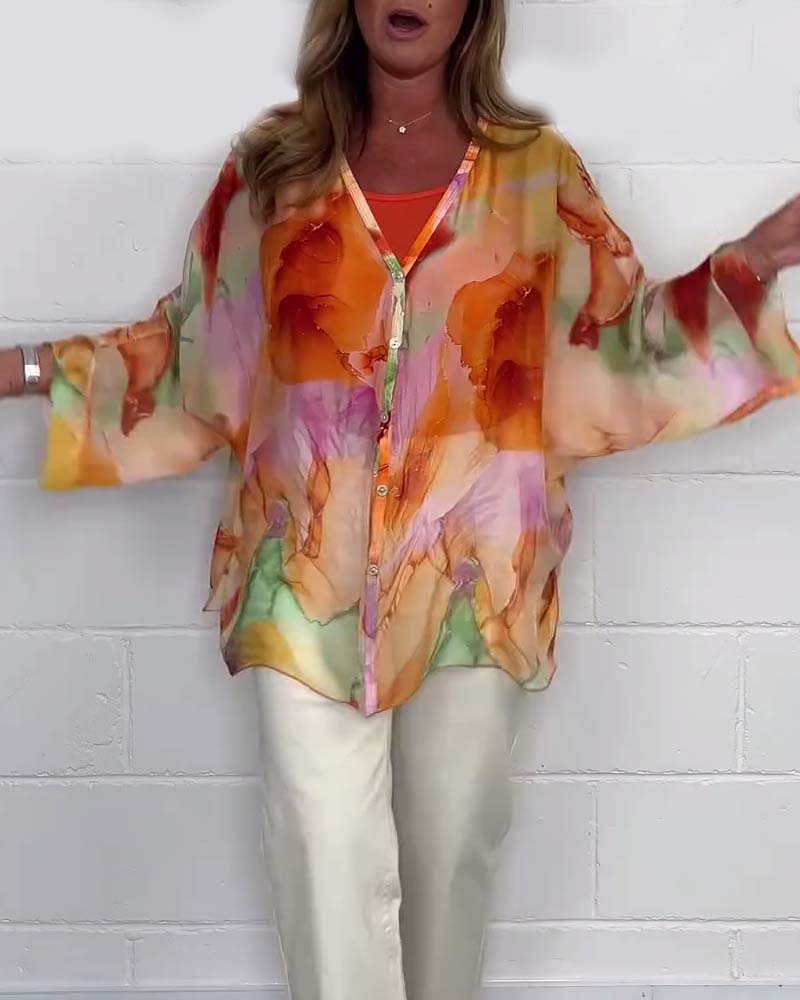 Uformell trykket V-hals bluse med lange ermer