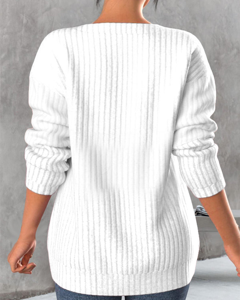 Topp med ensfarget med v-hals med glidelås