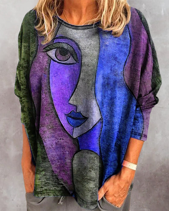 Langermet topp med ansiktstrykk