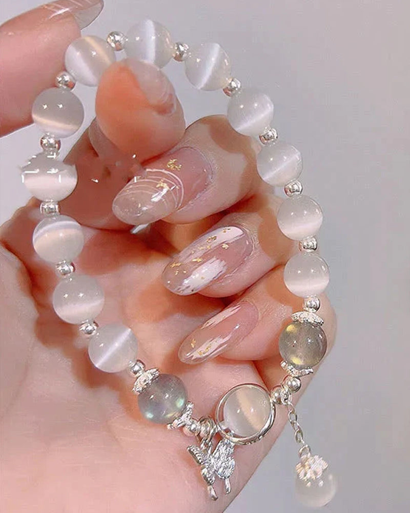 Sommerfuglarmbånd i imitert katteøyekrystall