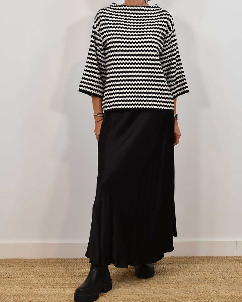 Topp med bølgestriper