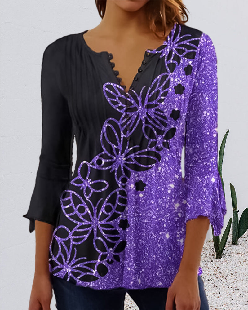 Topp med trykt V-hals