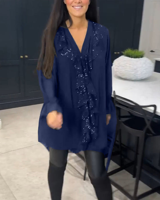 Bluse med volanger og elegant stil