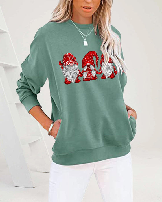 Langermet genser med tre julenisser