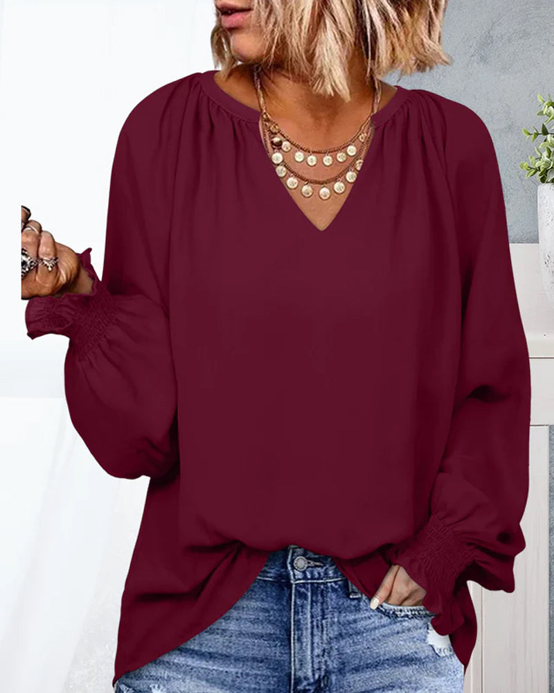 V-halset topp med elastiske mansjetter