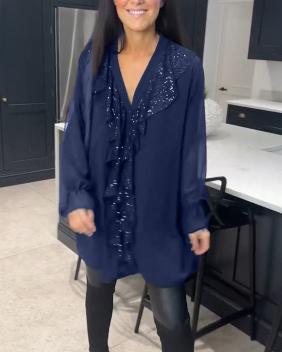 Bluse med volanger og elegant stil